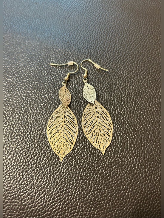 Nicole Miller Jewelry - NWOT. Nicole Miller Gold Leaf Earrings.
